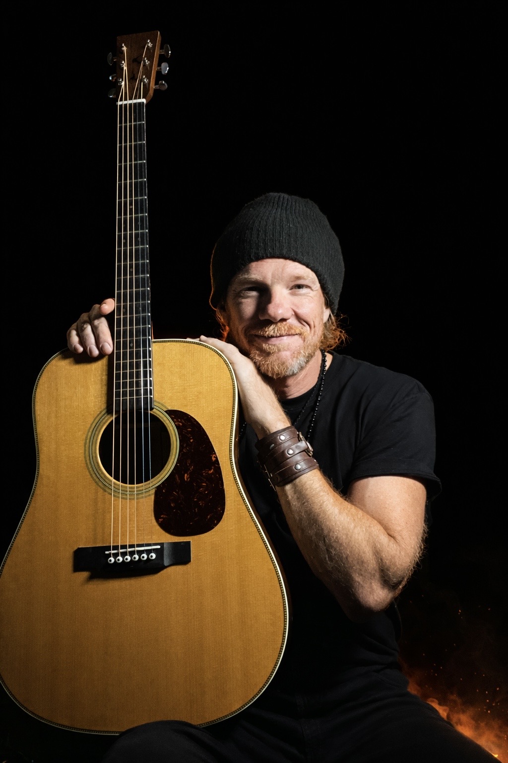 Ben Misterka with his acoustic guitar